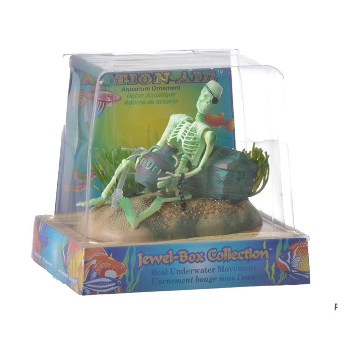 ESQUELETO CON TESORO RECOSTADO SOBRE UN COFRE O-85- PENNPLAX